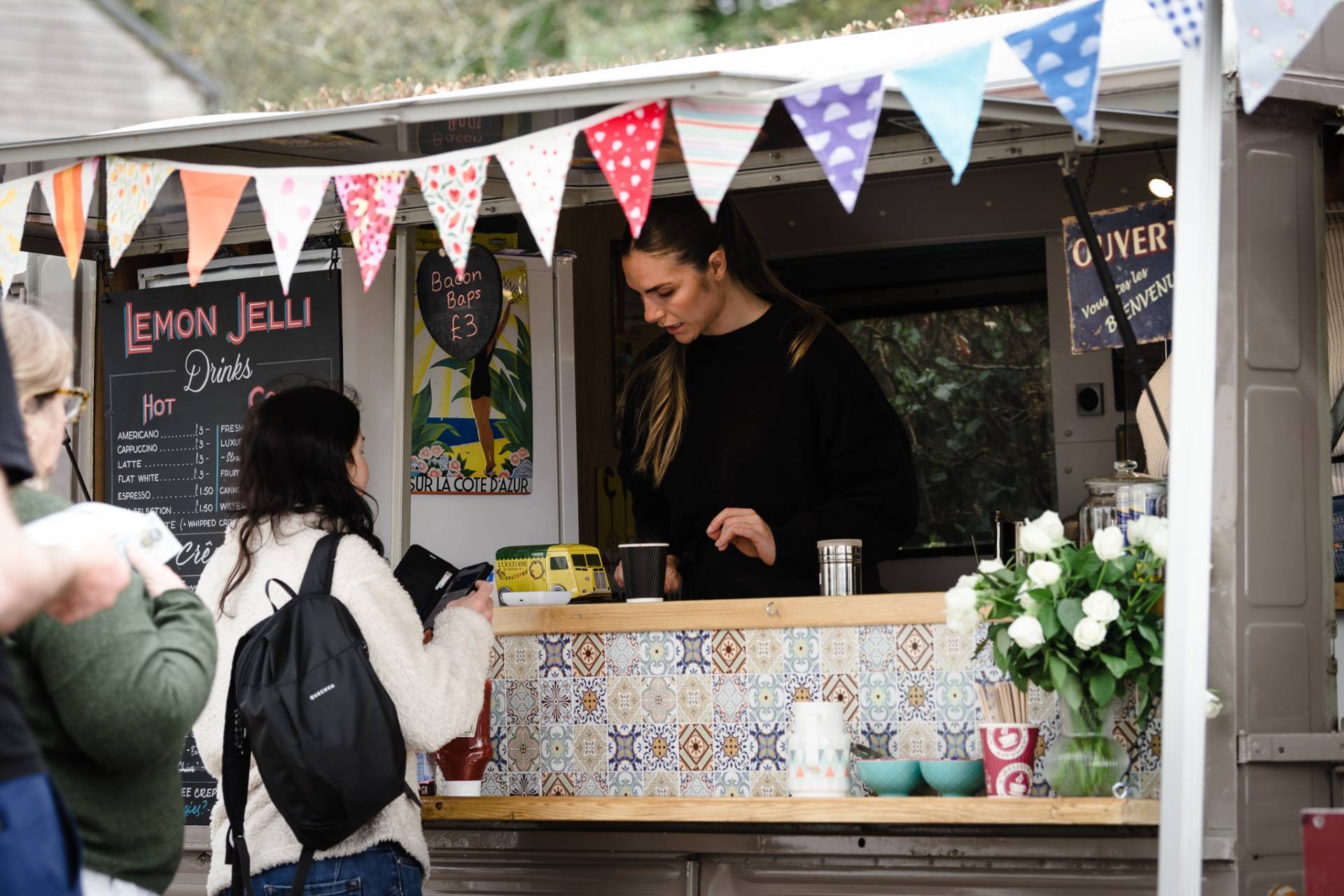 Lemon Jelli serving coffee at their stall